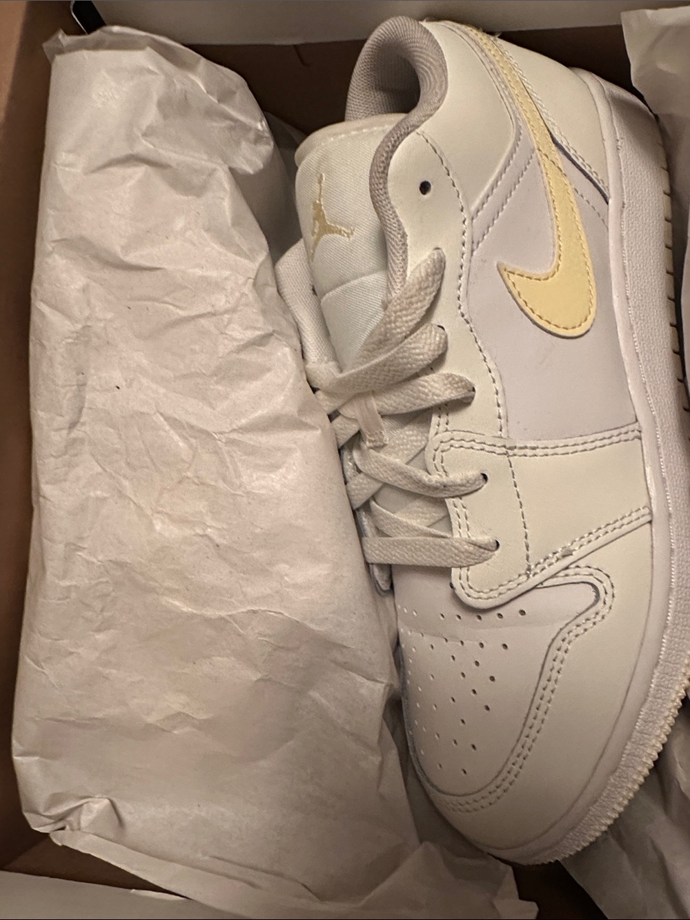 Jordan Low-Top Sneakers in a Pale Yellow and white color